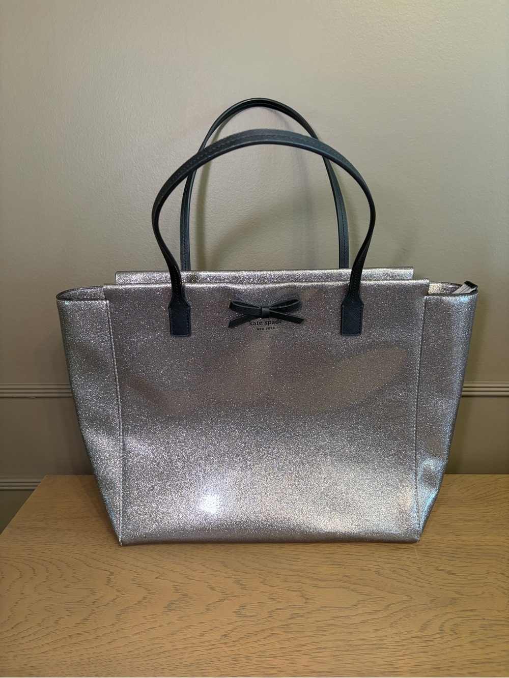 Kate Spade Silver Glitter Tote with Black Handles and Bow